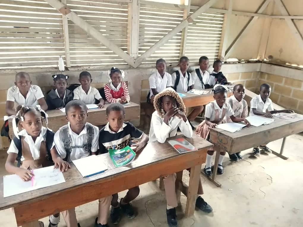Students at their desks in an HEF classroom in the mountains of southern Haiti