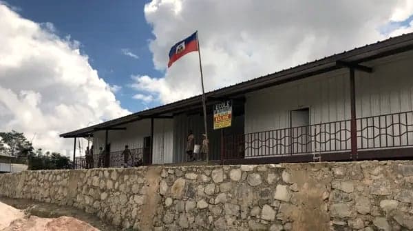 An HEF school with the Haitian flag flying